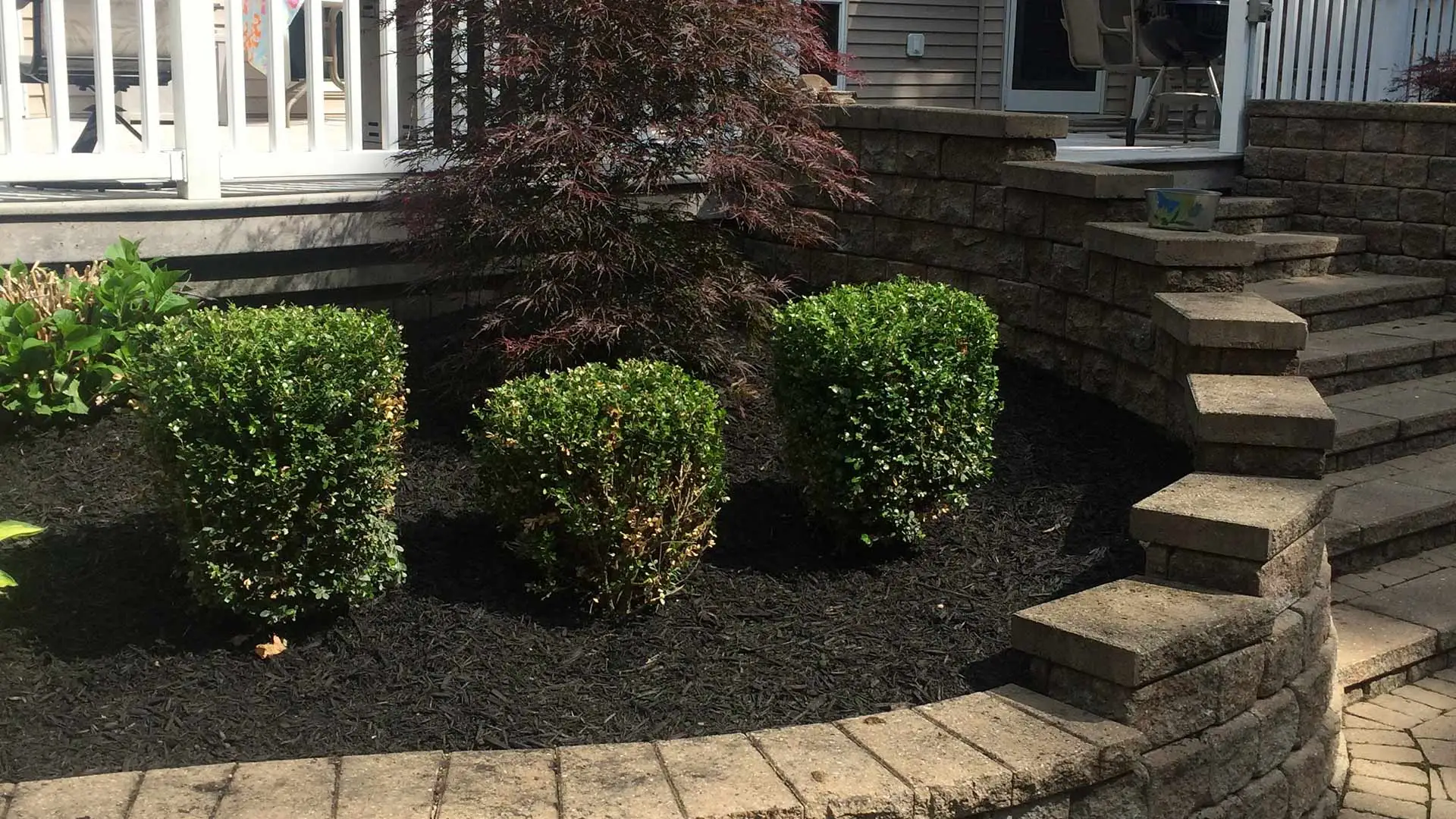 Mulch installed in a landscape bed at a home near Jefferson, OH.