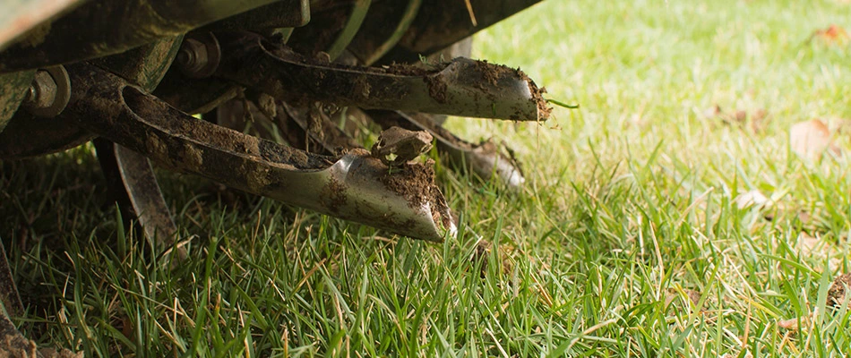 Aeration machine working on a lawn in and around Jefferson, OH.