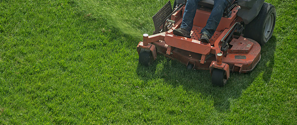 Lawn mower cutting a healthy green lawn near Ashtabula, OH.