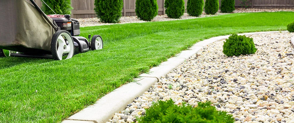 A lawn mower cutting grass in the spring in Madison, OH.